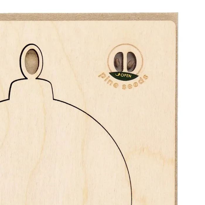 Gift Campaign Cartolina natalizia con decorazione a forma di pallina e semi di pino> Gadget Natalizi